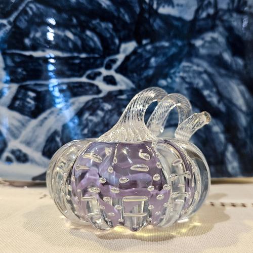 Pumpkin containing purple color with ornamental background