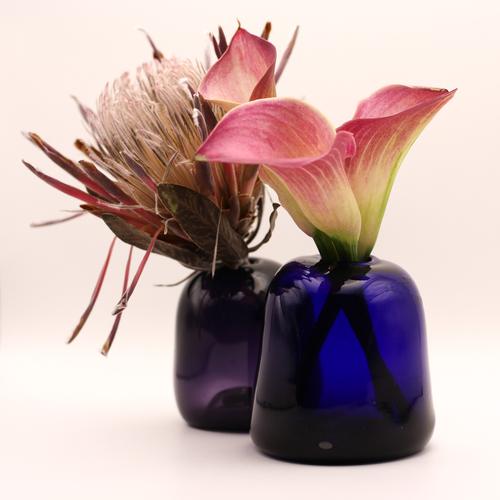 Two small vases with flowers